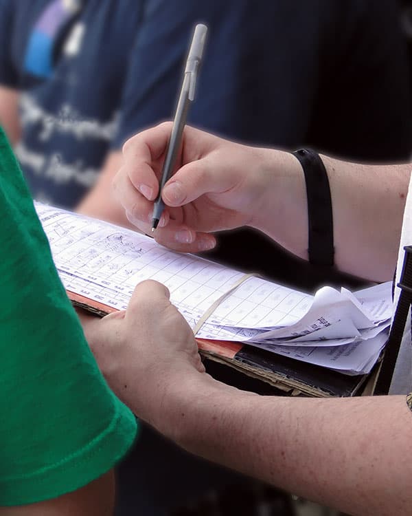 Someone signing a petition