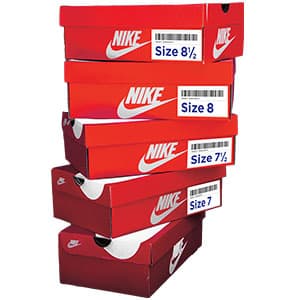 A stack of 5 Nike shoe boxes
