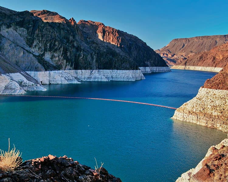 A dam has a lower water level than usual