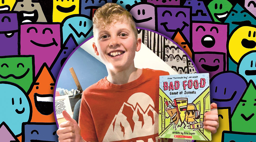 Eric Luper smiles and holds a book titled bad food.