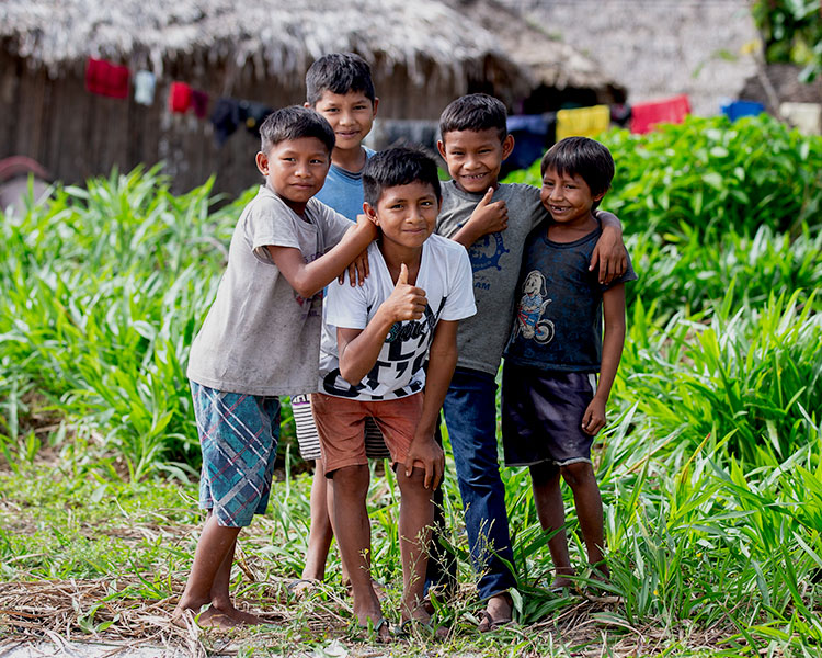 Five kids smiling for a photo