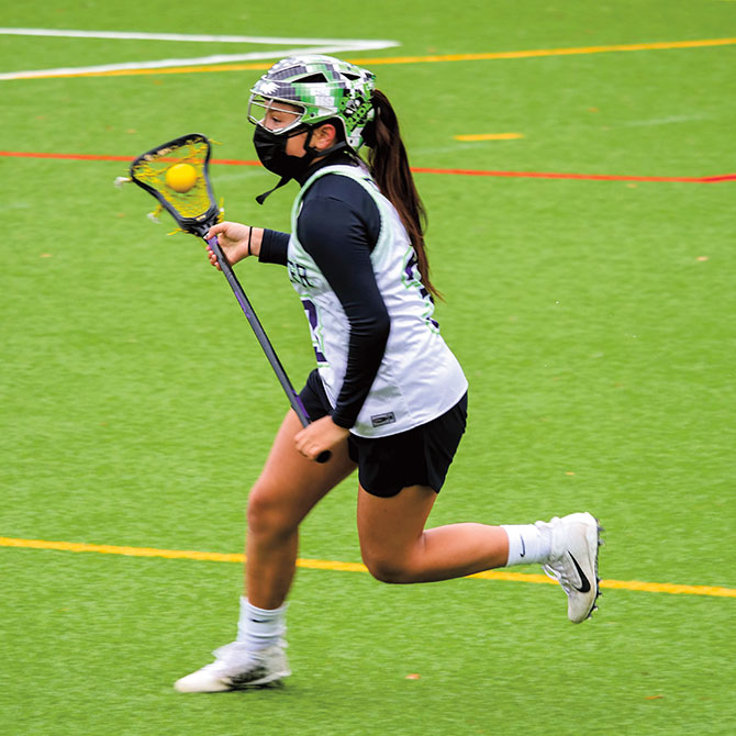Enlargeable photo of lacrosse player