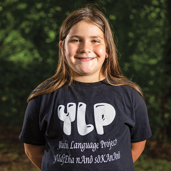 Enlargeable image of kid posing for photo