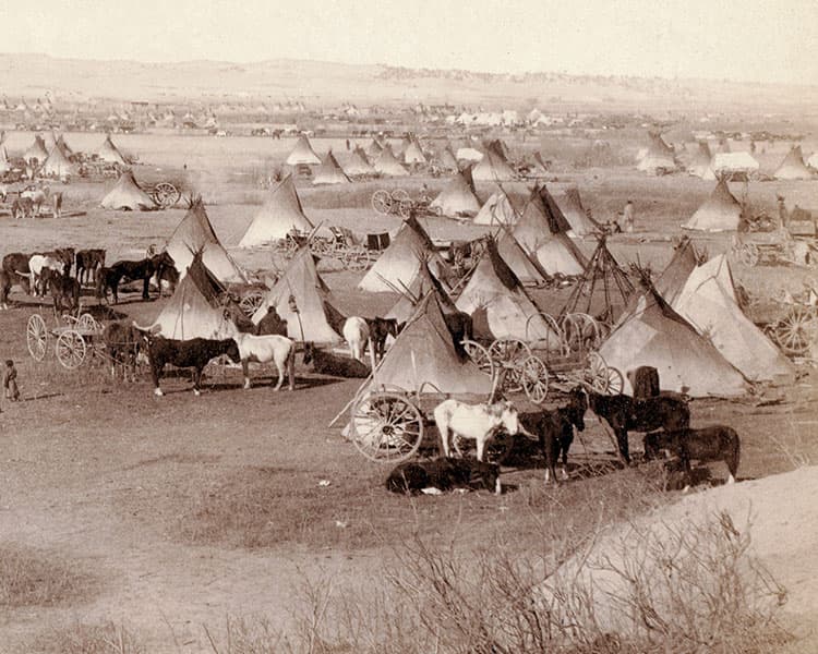 Black & white photo of a camp site