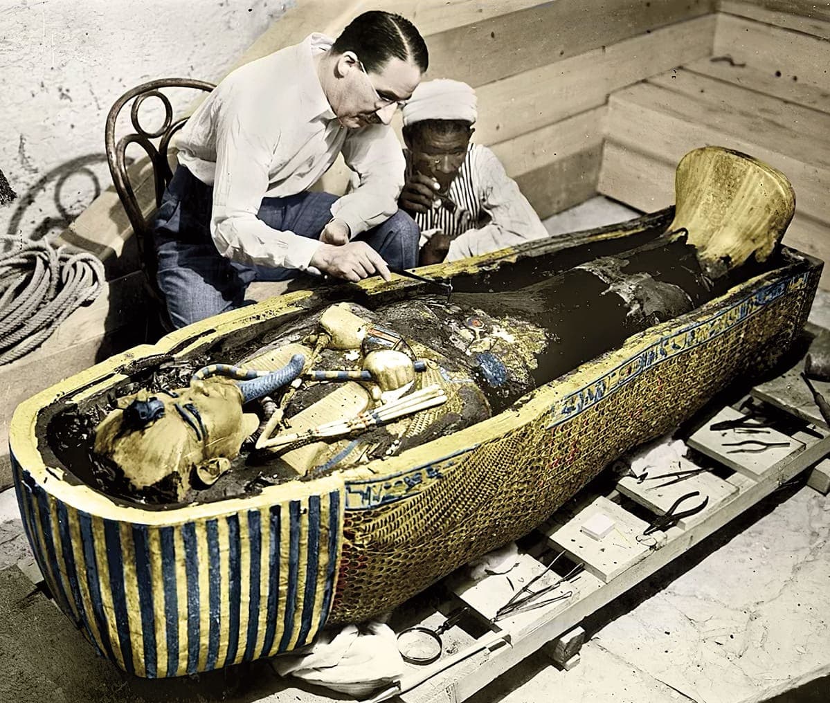 Colorized image of two people analyzing a pharaoh&apos;s tomb