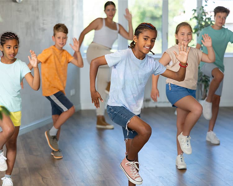 Photo of kids moving in sync