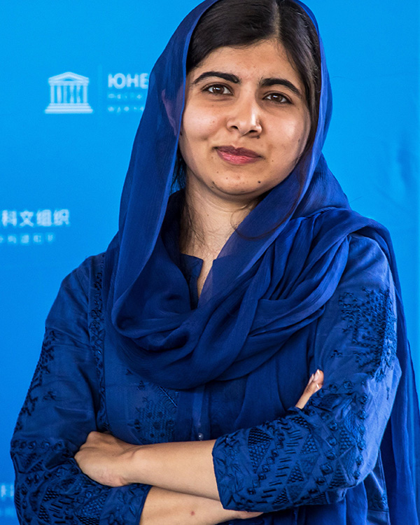 Image of Malala posing for photo