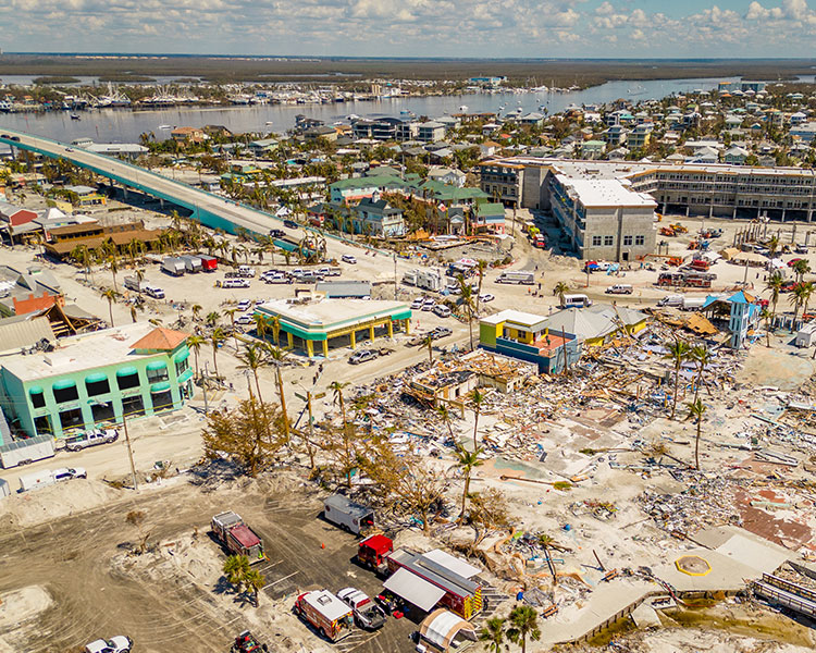 Bird&apos;s eye view of destroyed buildings on a city coast