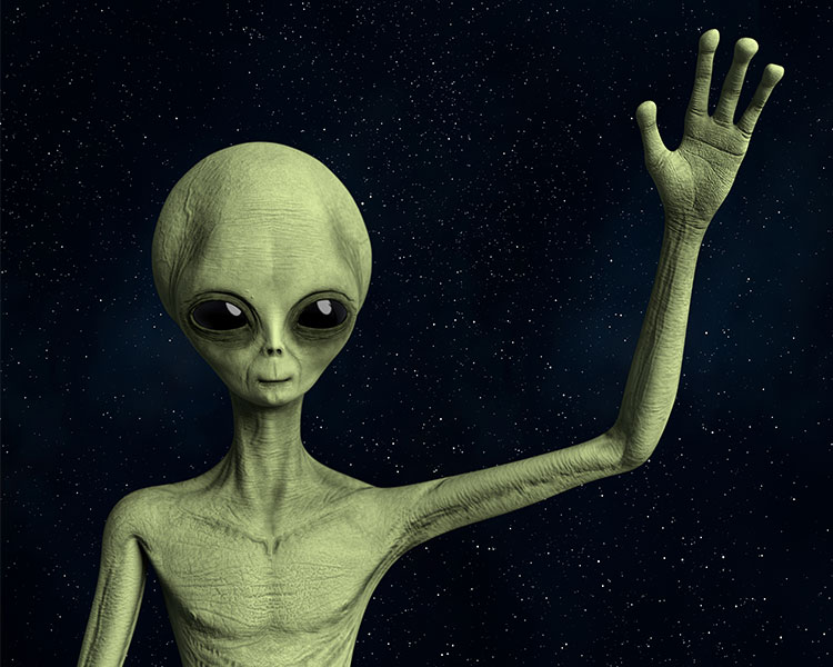 Image of a green alien waving